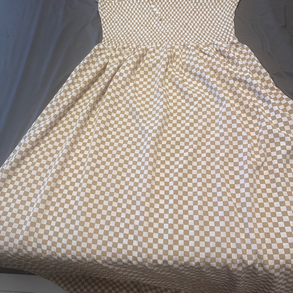 Pink lily dress with tie string straps and scrunch top. Brand new